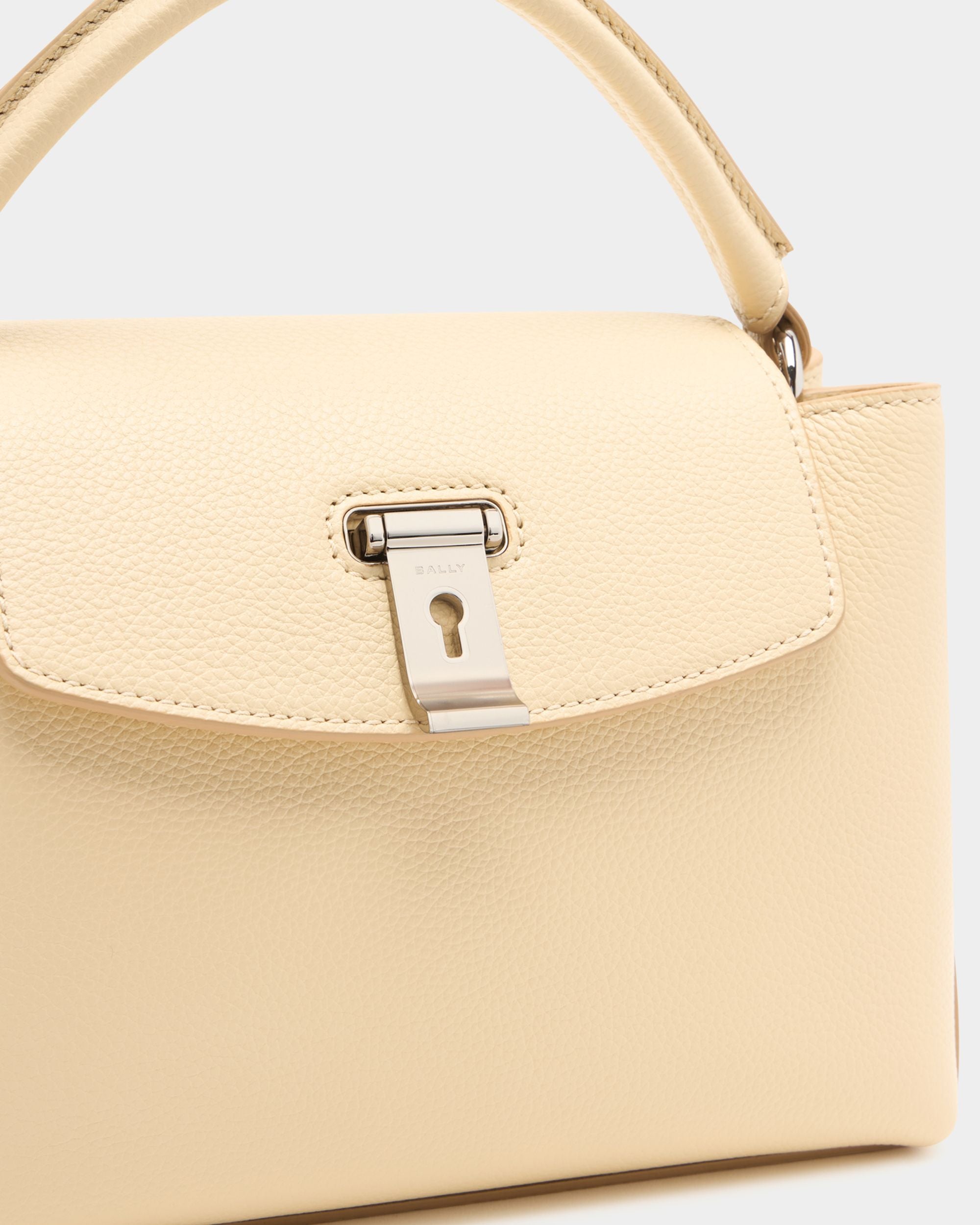Bally Global - Lock Me Small Top Handle Bag in Ginger Grained Leather - Beige
